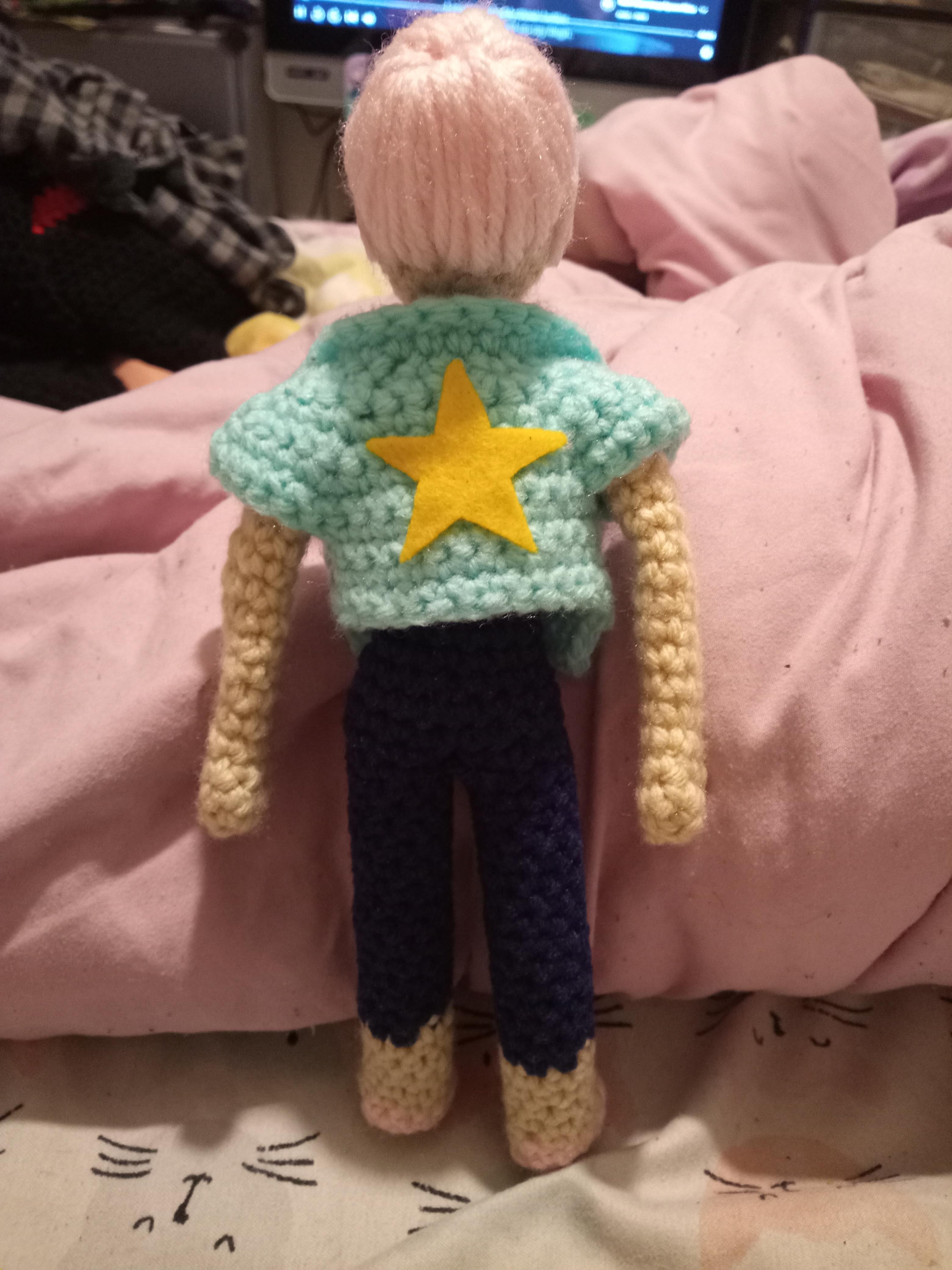 a back view of a crocheted Pearl from Steven Universe